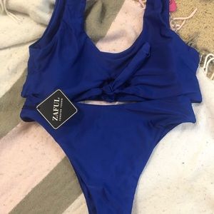 Women’s NWT suit size L (women’s 8) top/bottom